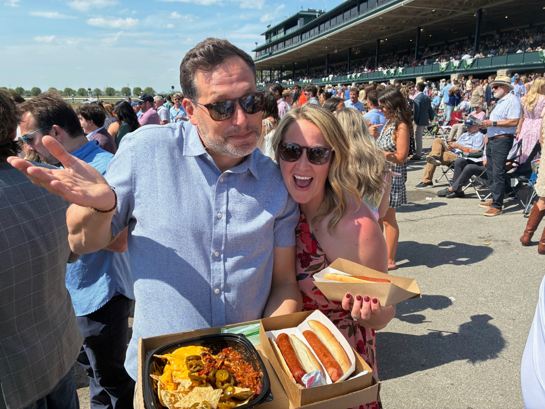 Andrew and Stacy at Keeneland with hot dogs and nachos